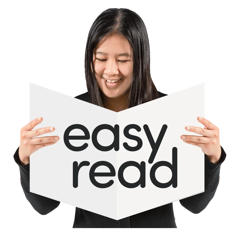 Woman holding a book which says 'Easy Read'